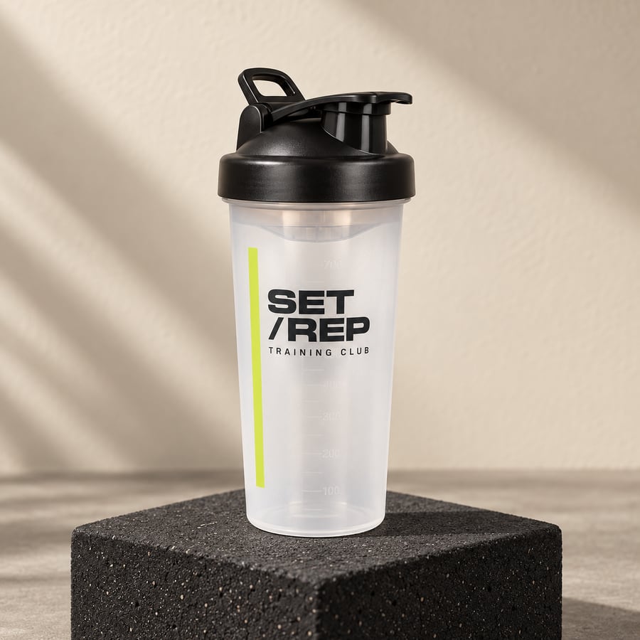 Transparent shaker med svart lock och SET / REP-profil i svart och lime